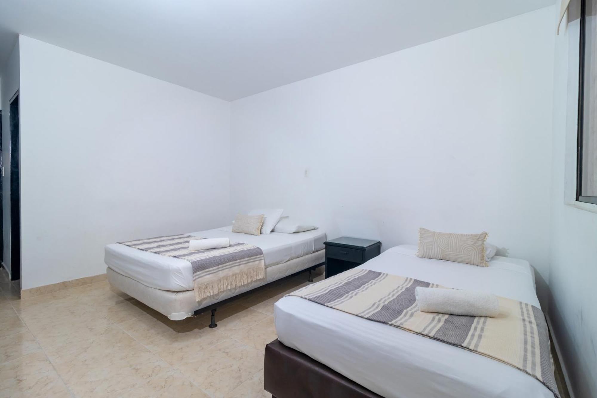 סנטה מרתה Hotel Axis Inn By Geh Suites מראה חיצוני תמונה